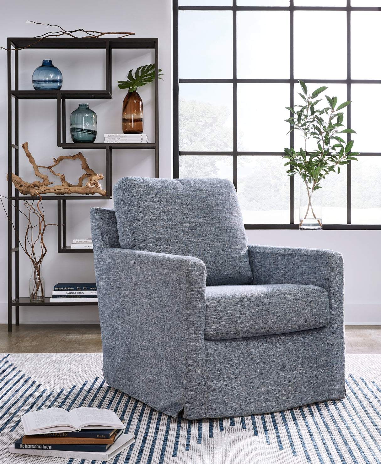 Nashville Furniture Outlets - Ashley Furniture - Nenana Next-Gen Nuvella Swivel Glider Accent Chair - Swivel Glider Accent Chair / Denim - A3000646