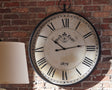 Nashville Furniture Outlets - Ashley Furniture - Augustina Wall Decor - Wall Clock / Antique Black - A8010110