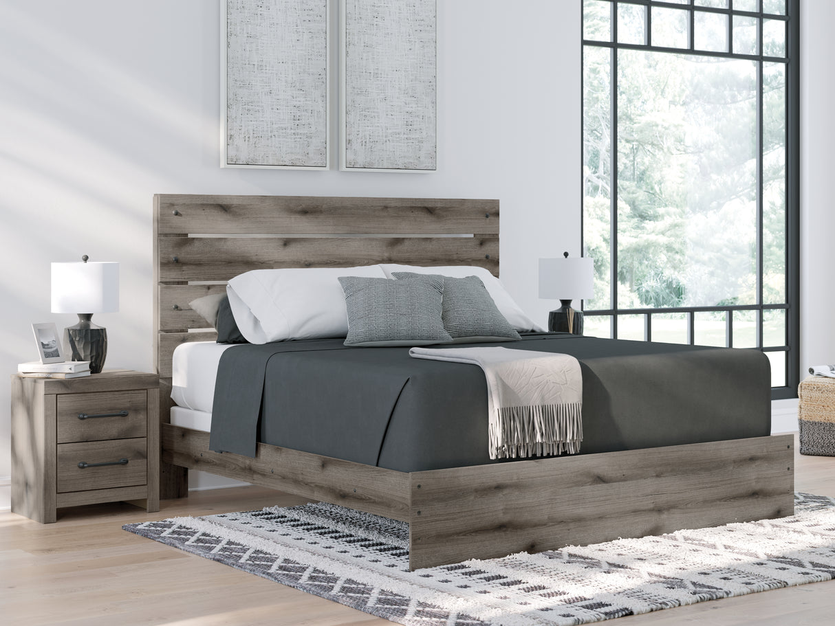 Nashville Furniture Outlets - Ashley Furniture - Graystorm Bedroom - King Panel Bed / Brown Gray - PCB2405B8
