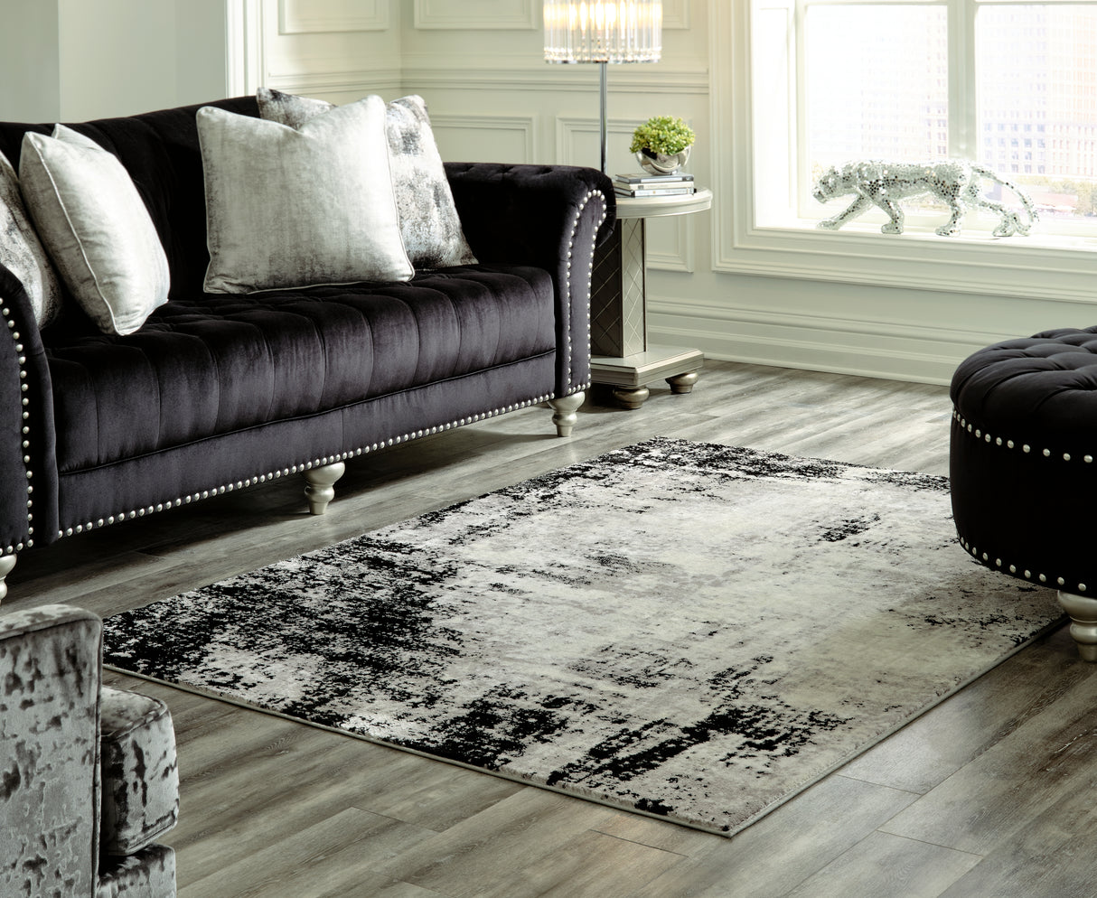 Nashville Furniture Outlets - Ashley Furniture - Zekeman Rug - 7'10" x 10' Rug / Black/Cream/Gray - R404921
