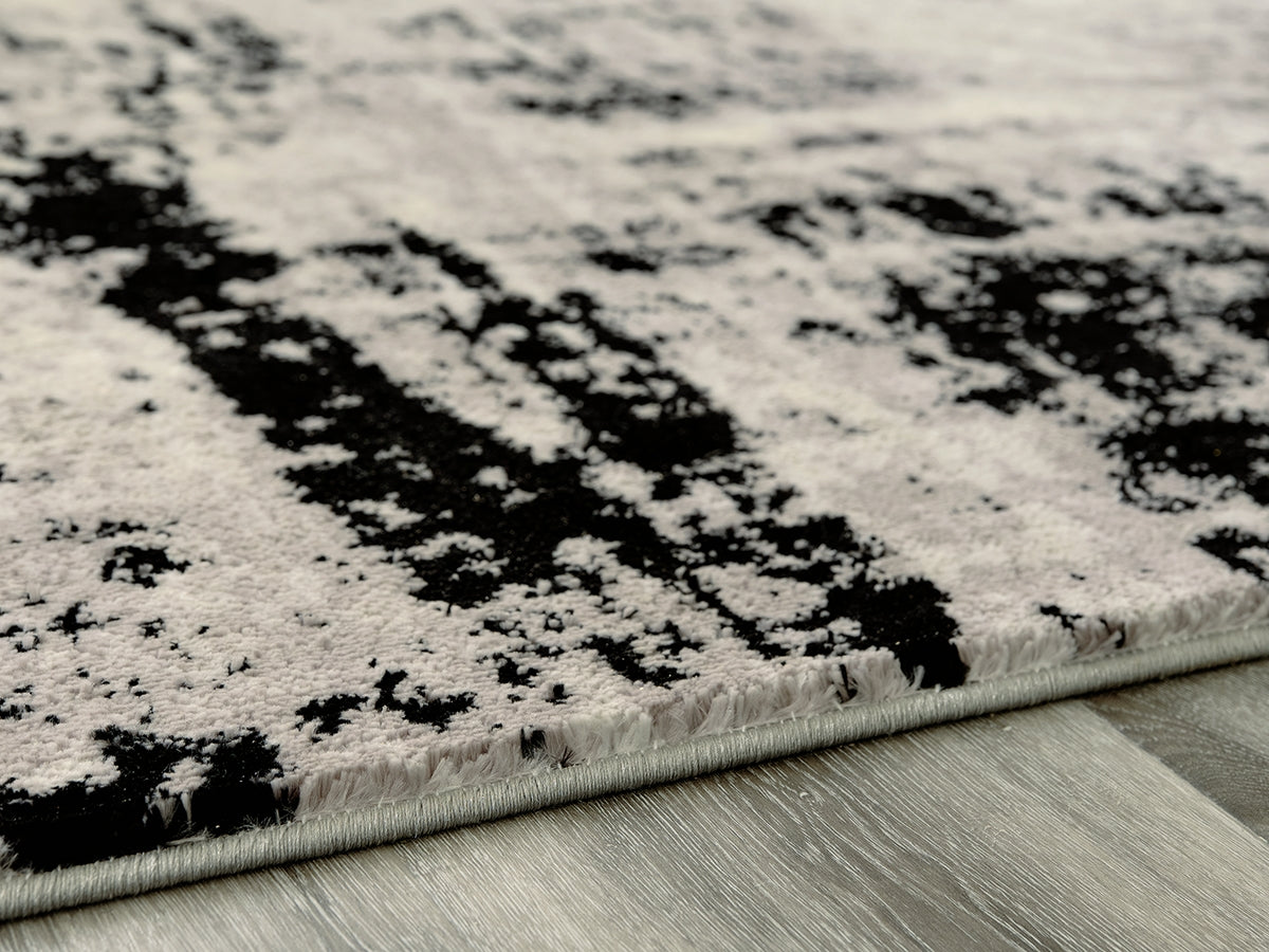 Nashville Furniture Outlets - Ashley Furniture - Zekeman Rug - 7'10" x 10' Rug / Black/Cream/Gray - R404921