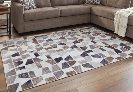 Nashville Furniture Outlets - Ashley Furniture - Jettner Rug - 7'10" x 10' Rug / Multi - R405781