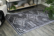 Nashville Furniture Outlets - Ashley Furniture - Arloman Rug - 5' x 7' Washable Rug / Black/Cream/Gray - R405932