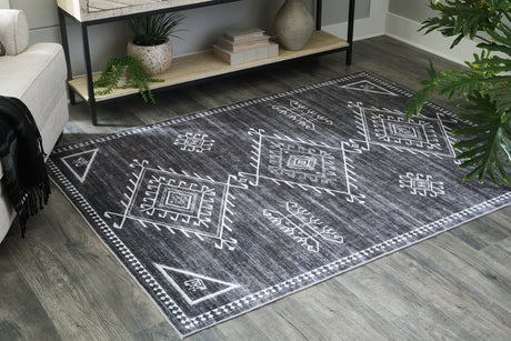 Nashville Furniture Outlets - Ashley Furniture - Arloman Rug - 5' x 7' Washable Rug / Black/Cream/Gray - R405932