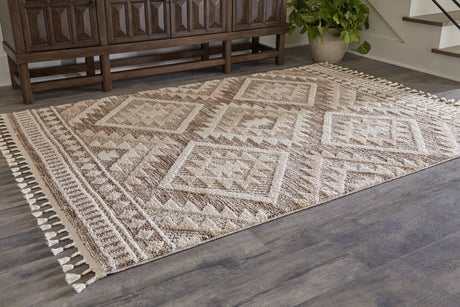 Nashville Furniture Outlets - Ashley Furniture - Odedale Rug - 8' x 10' Rug / Tan/Cream - R406061
