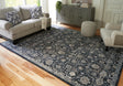Nashville Furniture Outlets - Ashley Furniture - Hilcott Rug - 7'10" x 10'6" Rug / Blue/Cream/Brown - R406111