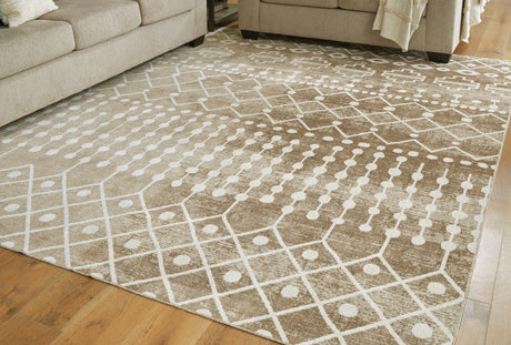 Nashville Furniture Outlets - Ashley Furniture - Bunchly Rug - 4'11" x 7'2" Washable Rug / Tan/Brown/Cream - R406222