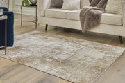 Nashville Furniture Outlets - Ashley Furniture - Grifflain Rug - 5'1" x 7' Washable Rug / Tan/Brown/Gray - R406232