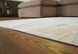 Nashville Furniture Outlets - Ashley Furniture - Truward Rug - 5' x 7' Rug / Linen/Gray/Caramel - R406472