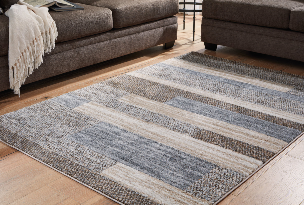 Nashville Furniture Outlets - Ashley Furniture - Sethburn Rug - 5' x 7' Rug / Cream/Brown/Gray - R406592