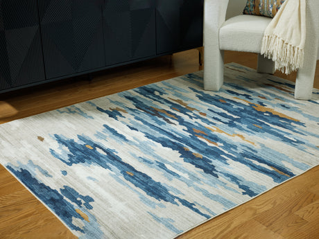 Nashville Furniture Outlets - Ashley Furniture - Vinlett Rug - 8' x 10' Washable Rug / Cream/Blue/Brown - R407041