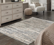 Nashville Furniture Outlets - Ashley Furniture - Gizela Rug - 7'10" x 10' Rug / Ivory/Beige/Gray - R404861