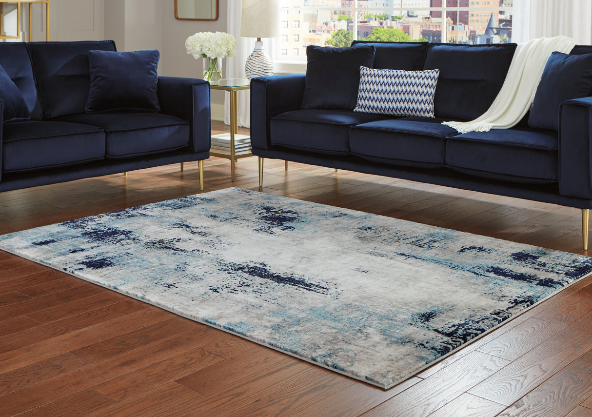 Nashville Furniture Outlets - Ashley Furniture - Leonelle Rug - 7'10" x 10' Rug / White/Blue/Gray - R404871