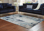 Nashville Furniture Outlets - Ashley Furniture - Leonelle Rug - 7'10" x 10' Rug / White/Blue/Gray - R404871