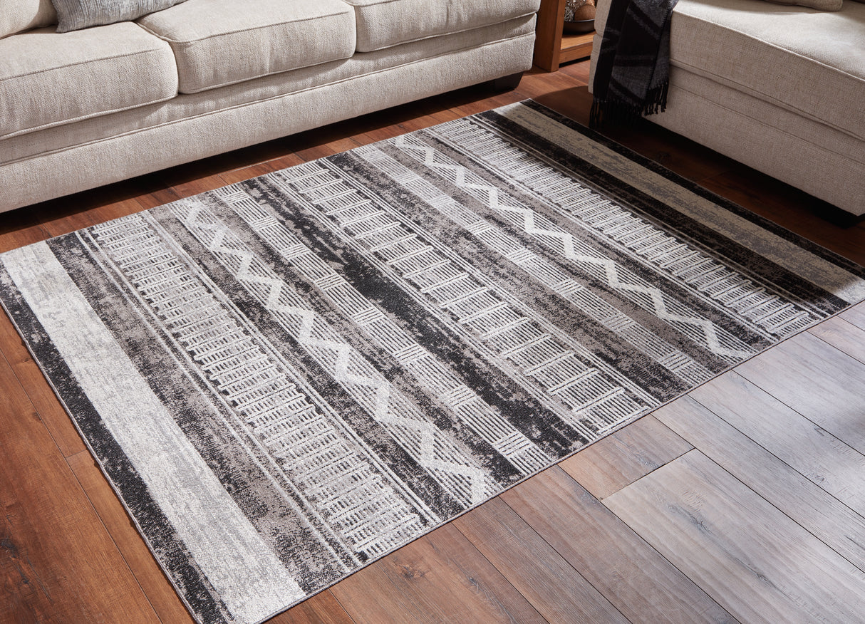 Nashville Furniture Outlets - Ashley Furniture - Henchester Rug - 8' x 10' Washable Rug / Multi - R405991