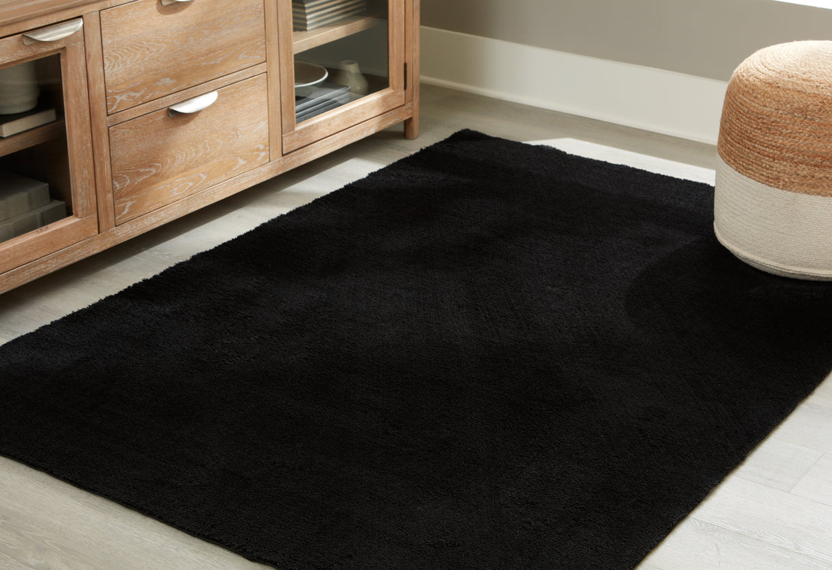 Nashville Furniture Outlets - Ashley Furniture - Anaben Rug - 5' x 7' Washable Rug / Black - R406312