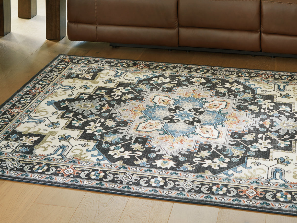 Nashville Furniture Outlets - Ashley Furniture - Leningston Rug - 5' x 7' Washable Rug / Black/Cream/Blue - R407062